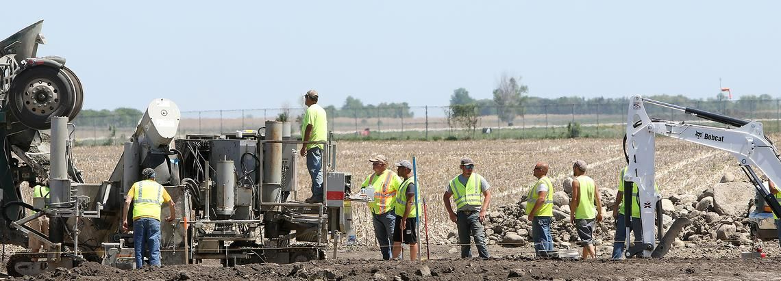 construction workers at field site